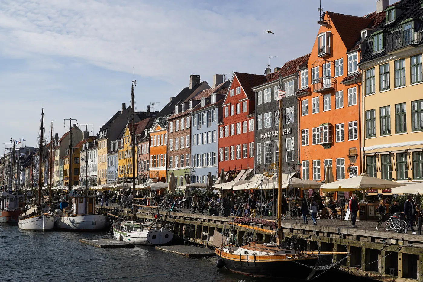 Colourful houses and boats along the Nyhavn canal in Copenhagen